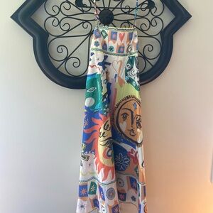 Only worn once. Very trendy pattern dress. Super cute and in great condition!